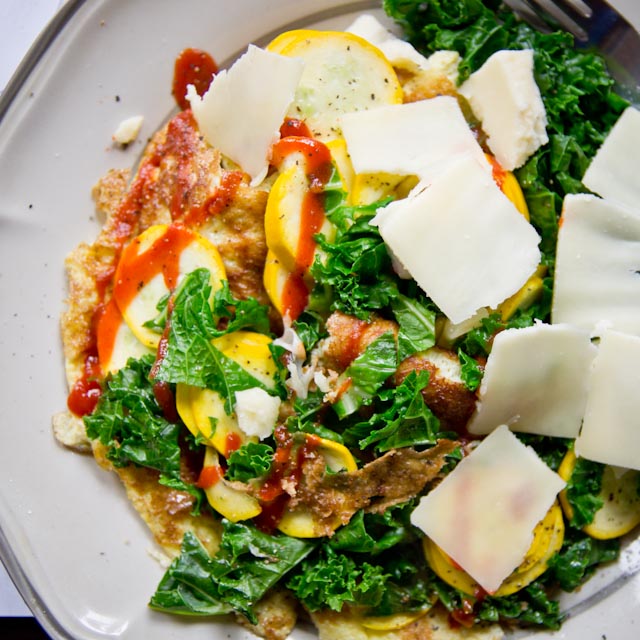 Open-face omelet with zucchini, kale, and cheese